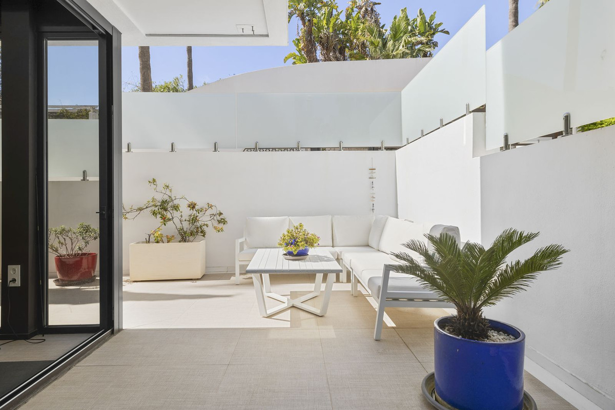 Modern Coastal Living in Cabopino – Ground Floor Apartment with Private Garden and Premium Finishes