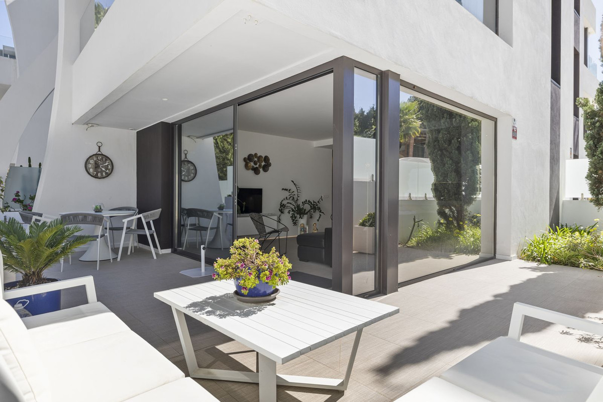 Modern Coastal Living in Cabopino – Ground Floor Apartment with Private Garden and Premium Finishes