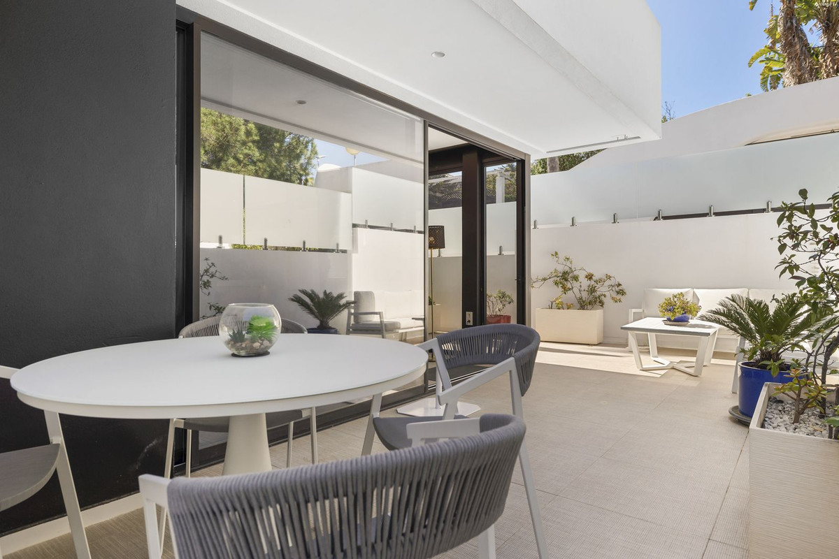 Modern Coastal Living in Cabopino – Ground Floor Apartment with Private Garden and Premium Finishes